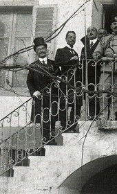 MSG018: Durrës: Essad Pasha Toptani [in uniform] and dignitaries, March 1914 (Marquis di San Giuliano Photo Collection).