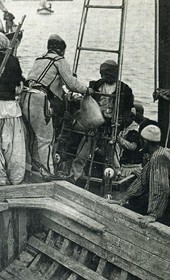 MSG063: Durrës: Northern Albanian fighters leaving Durrës by boat, second view, June 1914 (Marquis di San Giuliano Photo Collection).