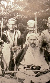 B044: “Highland Ghegs of the Dukagjin tribe near Koman on the Drin River” (Photo: Alexandre Baschmakoff, September 1908).