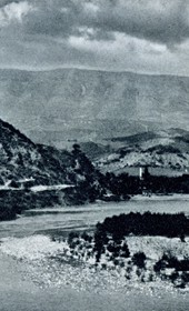 HAB41: “View from the bridge over the Osum River near Berat. In the background are curious land formations on Maja e Shpiragut [Mount Shpirag]” (Photo: Hugo Bernatzik, 1929).