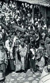 HAB45: “The Archimandrite of Albania leading the procession in Shijon. Behind him is the coffin with the bones of Saint John [Saint John Vladimir]. The crowds endeavour to touch the relics” (Photo: Hugo Bernatzik, 1929).