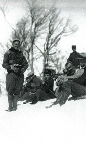 “Dr. Carleton Coon (seated, front right) and his party, taking time out for a rest on the snow-covered landscape” (Photo: Carleton Coon 1929).