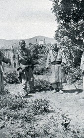 OVG023: Murderers attending the funeral of their victim (Photo: Major Spaits 1912).