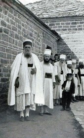 EVL102: Bektashi clergymen at a monastery on the way up to Mount Tomor (Photo: Erich von Luckwald, ca. 1936).