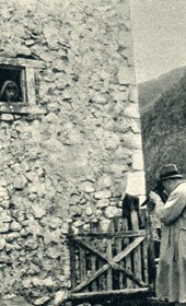 GM044: Giuseppe Massani photographing a child in Theth, with Father Anton Kiri on the right (Photo: Giuseppe Massani, 1940).