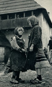 GM047: Two girls of Okol the Shala Valley wearing xhubletas (bell-shaped skirts) (Photo: Giuseppe Massani, 1940).