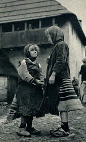 GM047: Two girls of Okol the Shala Valley wearing xhubletas (bell-shaped skirts) (Photo: Giuseppe Massani, 1940).