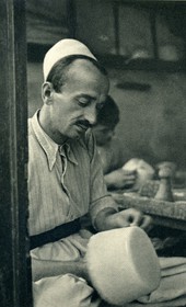 GM064: Making white felt caps (plis or qeleshe) in Tirana (Photo: Giuseppe Massani, 1940).