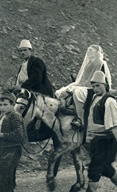 GM118: The veiled bride in a wedding procession near Tepelena (Photo: Giuseppe Massani, 1940).