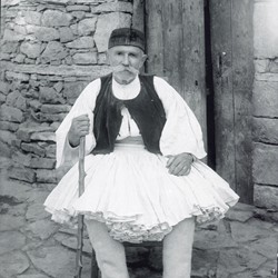 DhV002: An elderly man dressed in a traditional Albanian fustanella of 150 pleats. Kolonja, Albania (photo: Dhimitër Vangjeli).