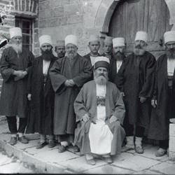 DhV010: The baba and his dervishes at the Bektashi tekke (convent) of Haxhi Baba Horasani in Qesaraka. Kolonja, Albania (photo: Dhimitër Vangjeli).